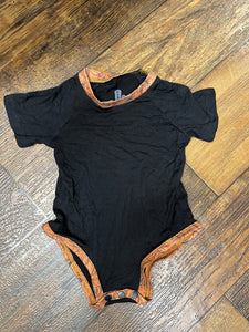 Black onesie with leather accent